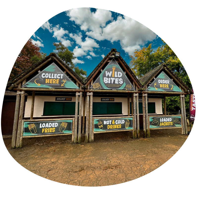 Exterior of the Wild Bites restaurant at West Midlands Safari Park, showing the entrance and restaurant signage